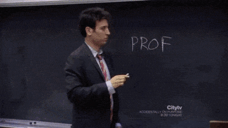 a man stands in front of a blackboard writing the word Prof