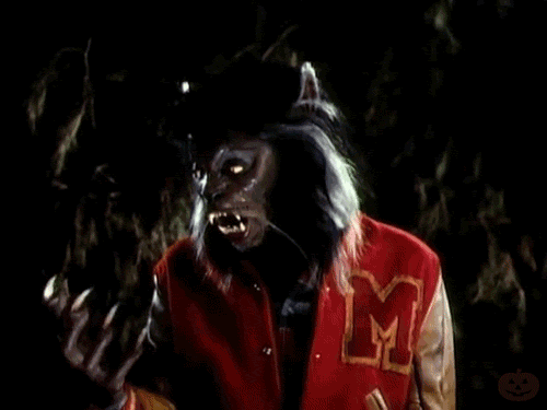 a werewolf is wearing a red varsity jacket with the letter m on it