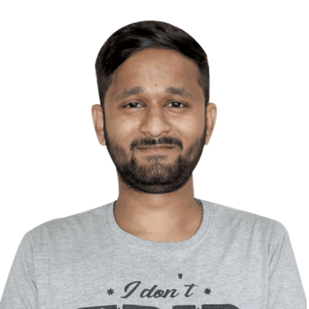 a blurry picture of a man with a beard wearing a grey shirt