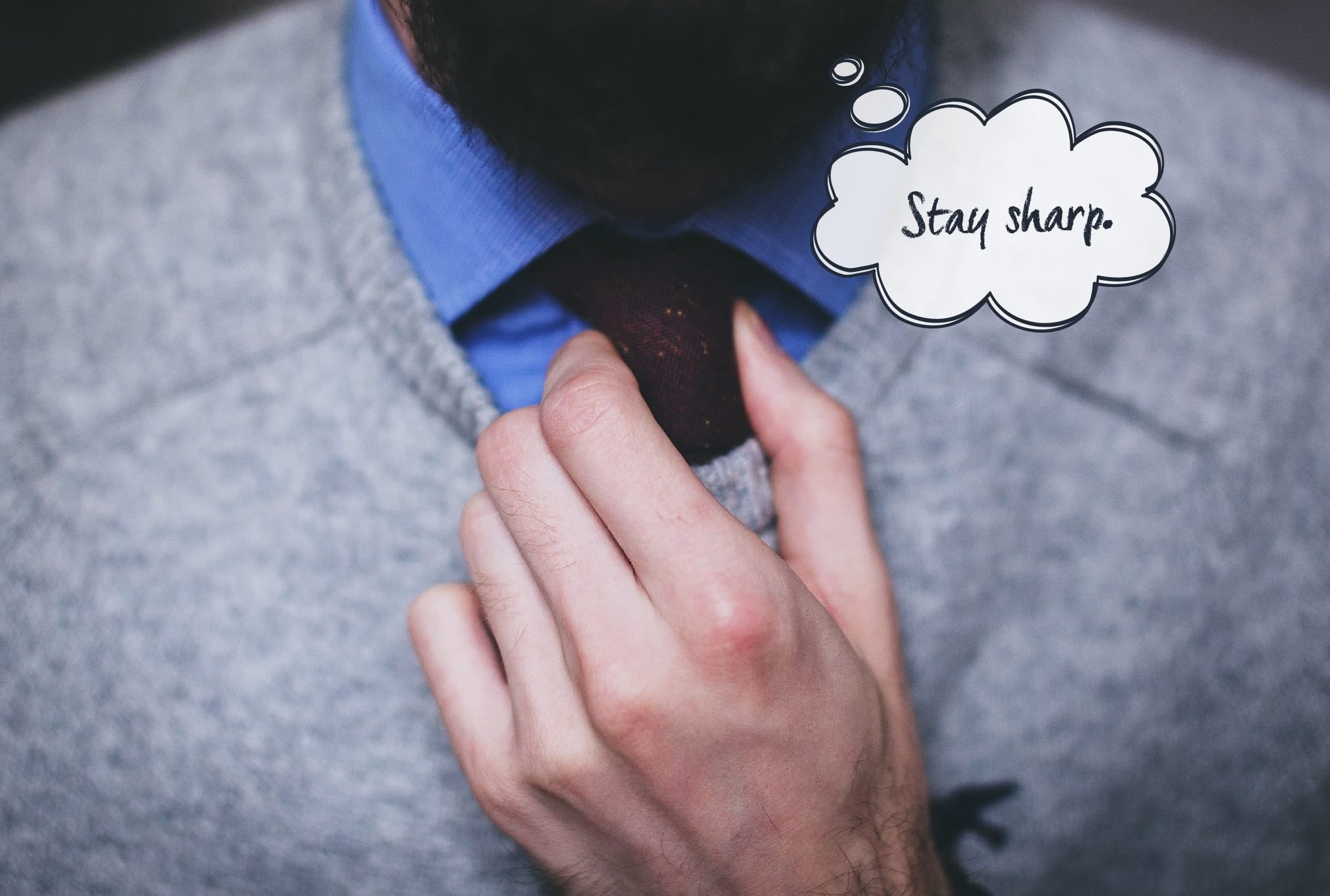 a man adjusts his tie with a thought bubble that says stay sharp