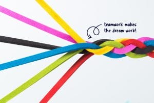 a braided string with the words teamwork makes the dream work on it