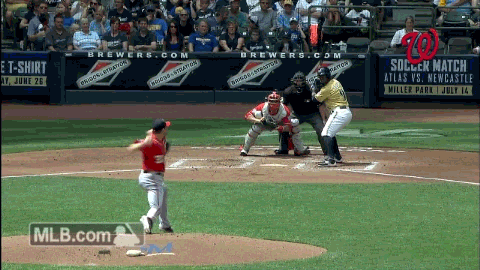 a baseball game is being played between brewers and atlas