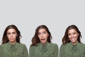 three different facial expressions of a woman in a green shirt representing a trapper, hunter and farmer in sales.