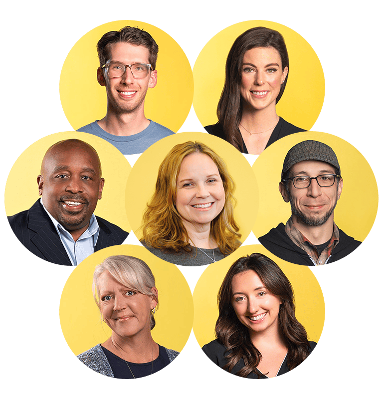 Nutshell Teammedlemmer poserer til et billede på en gul baggrund