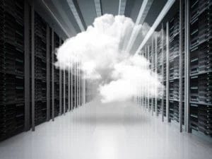 a server room with a cloud in the middle of it