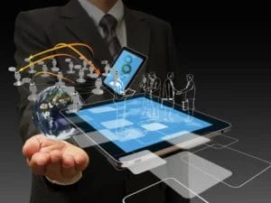 a man is holding a tablet with drawings of people on it