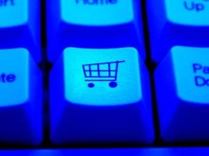 a blue keyboard with a shopping cart on it