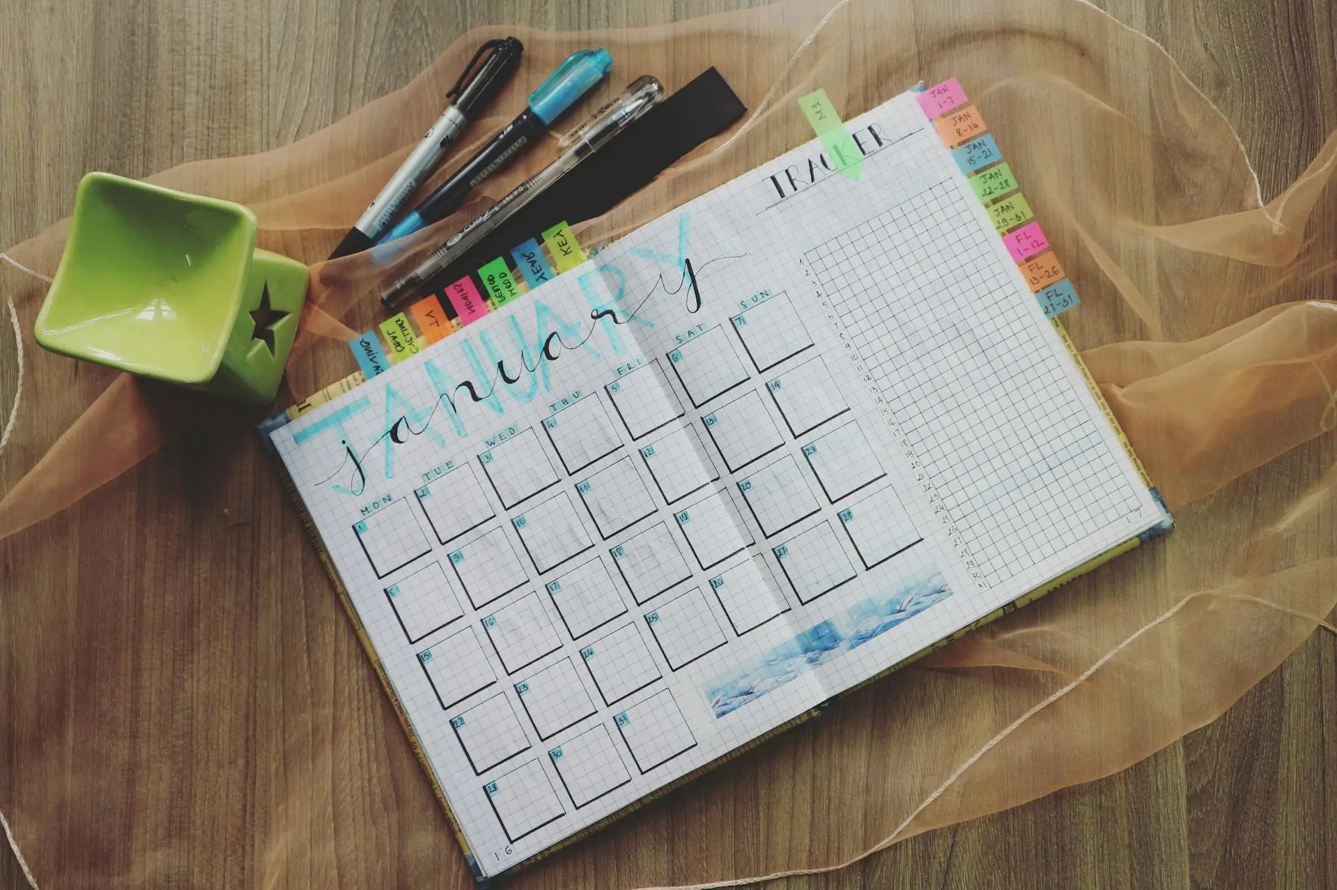 Calendar planner notebook open to January