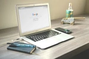 Google search open on laptop on desk