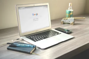 Google search open on laptop on desk