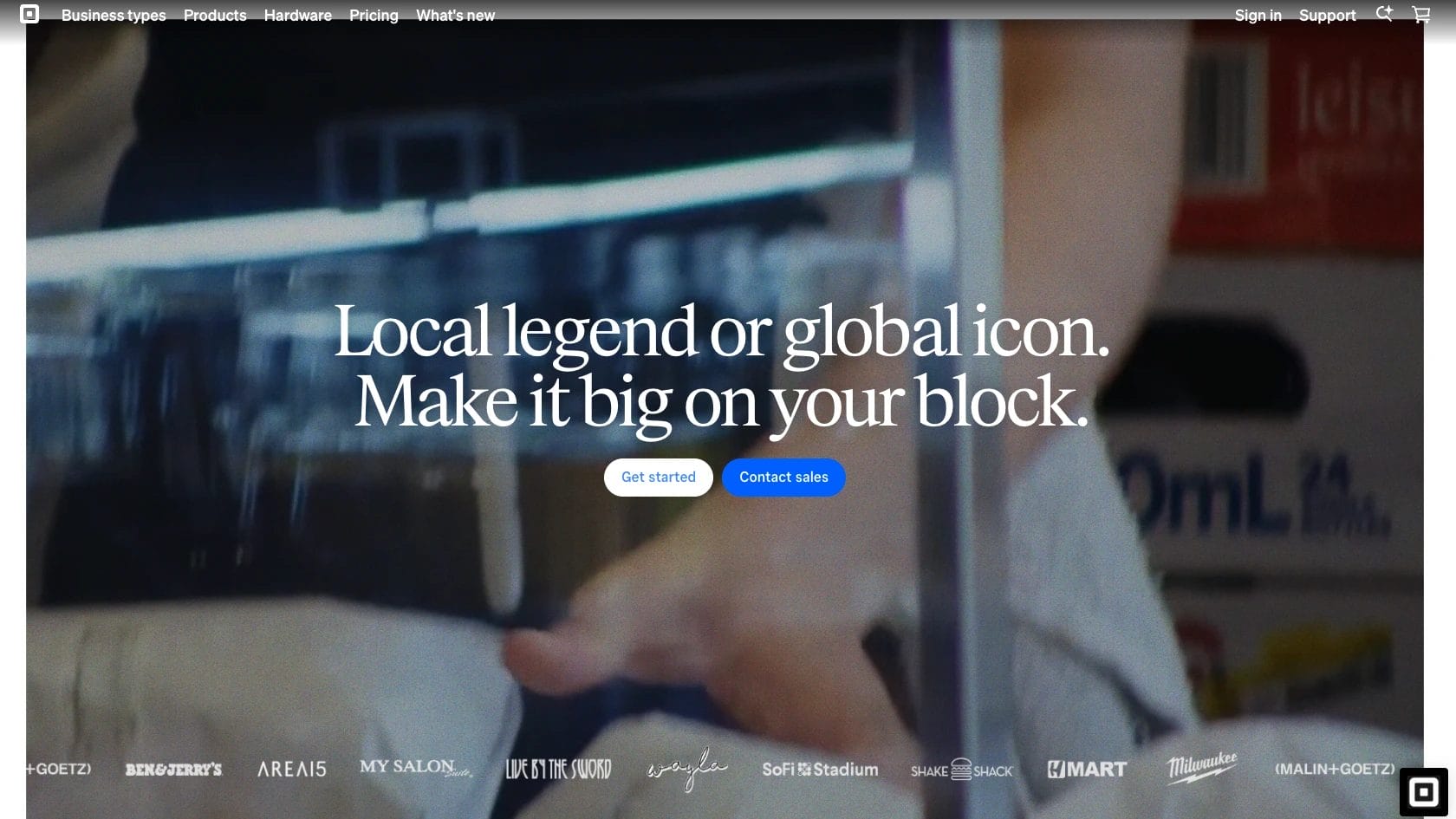 Square's homepage showing people using their POS systems